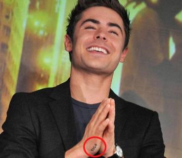 Cool Celebrity Tattoos, Zac Efron's YOLO Tattoo means you only live once