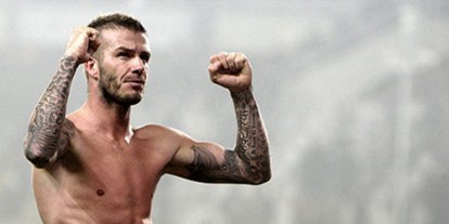 David Beckham topless on the field playing football, Cool Celebrity Tattoos; David Beckham's Tattoos